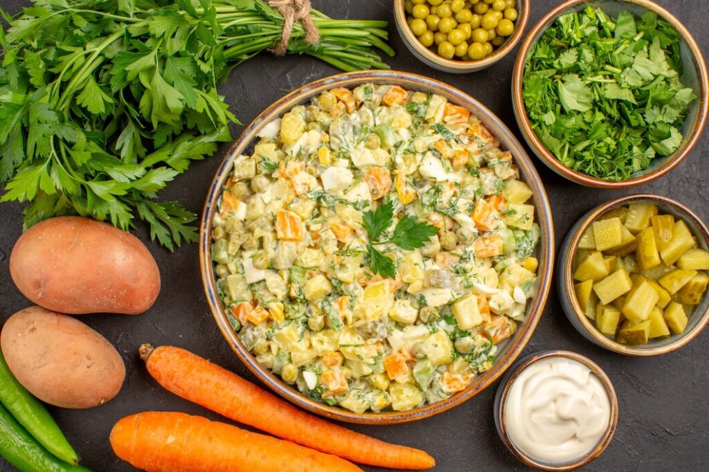 top-view-delicious-salad-with-fresh-vegetables-dark-surface_140725-75193